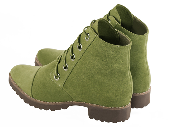 Women's pistachio green elegant ankle boots, with laces at the front. Round toe. Thick rubber soles - Rear view